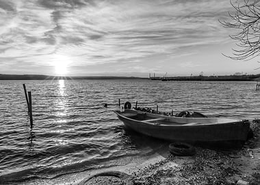 Boat on a lake at sunset