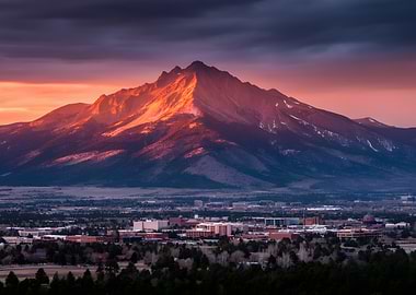 Mountain Sunrise Over Cityscape