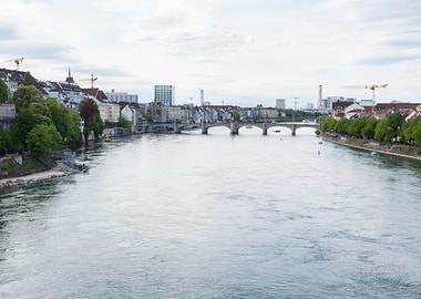 Basilea's Cityscape with panoramic views of the city’s bridges and buildings.