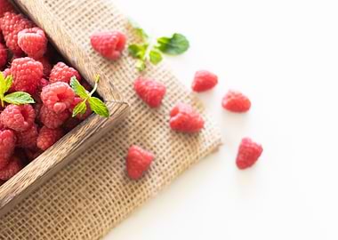 Fresh Raspberries in a Wooden Crate