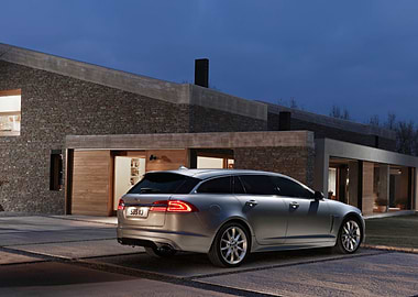 Jaguar Estate Car in Modern Driveway