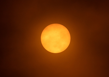 Sun with a small dark spot
