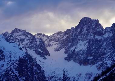 Snowy Mountain Peaks at Sunrise