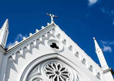 White Church Facade with Blue Sky
