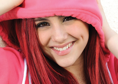 Young Woman with Red Hair and Pink Hoodie