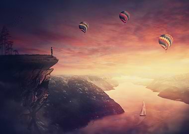 Man on cliff overlooking fjord with hot air balloons