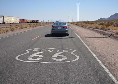 Route 66 road sign with car