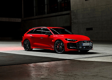 Red Audi RS6 Avant in Industrial Setting