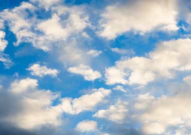Blue Sky with Fluffy Clouds