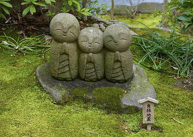 Three Stone Jizo Statues in Moss Garden