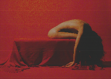 Woman in dramatic pose on red background