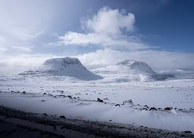 Snowy mountains under a blue sky