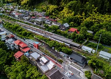 Japanese Train Station in a Lush Green Valley