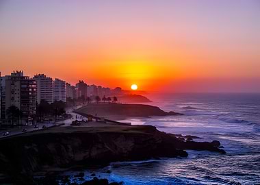 Coastal City Sunset Over Ocean