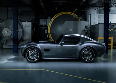 Sleek Gray Sports Car in Industrial Setting