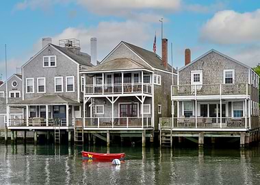 Waterfront Houses with Red Boat