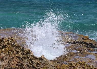 Ocean Wave Crashing on Rocks