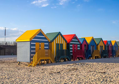 Colorful Beach Huts on a Sandy Shore