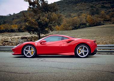Red Ferrari Sports Car on Road