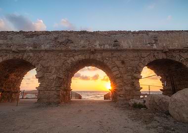 Ancient Aqueduct Arches at Sunset
