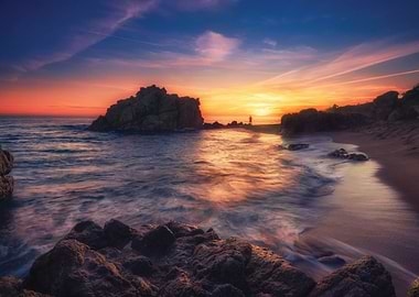 Sunset over a rocky beach