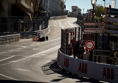 Formula E car racing on Monaco street circuit