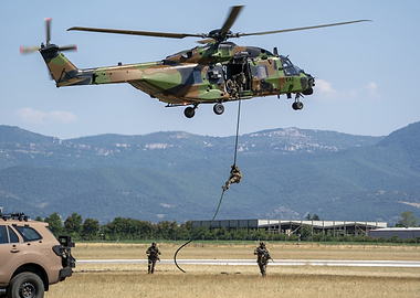 Military Helicopter Rappelling Soldiers