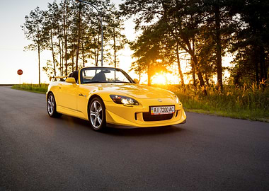 yellow Honda S2000 at sunset