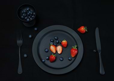 Minimalist Black Plate with Fresh Berries