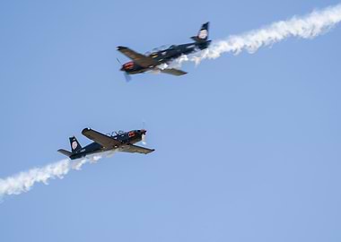 Two T-6 Texan II Aircraft Performing