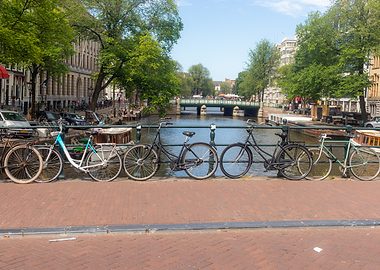 Bicycles parked on Amsterdam canal bridge