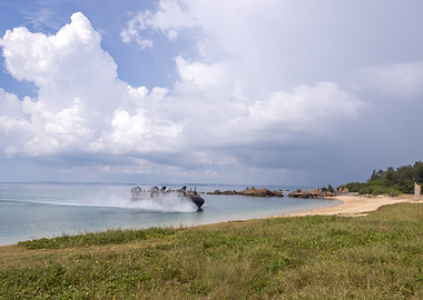 Military Hovercraft Landing on Beach