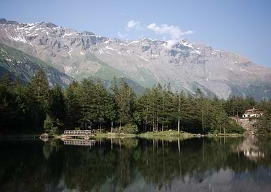 Serene Alpine Lake and Mountain Landscape