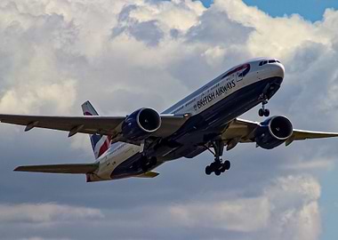BA 777-236 taking off from Heathrow RWY 27R Reg: G-VIIM