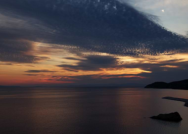 Dramatic Sunset Over Calm Sea