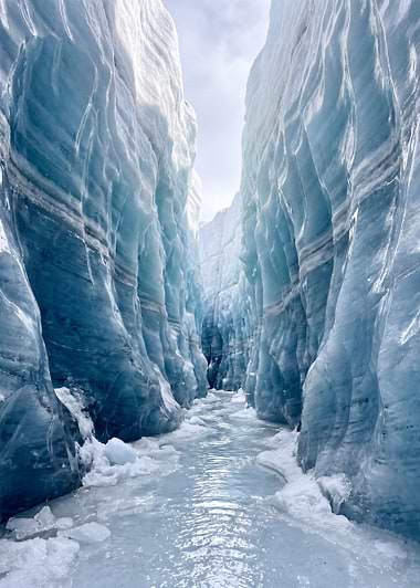 Blue Ice Canyon Meltwater Stream, metal print by Isla Elsewhere