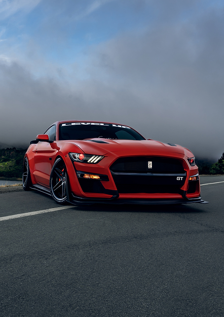 Red Ford Mustang GT on Road / PLATINA