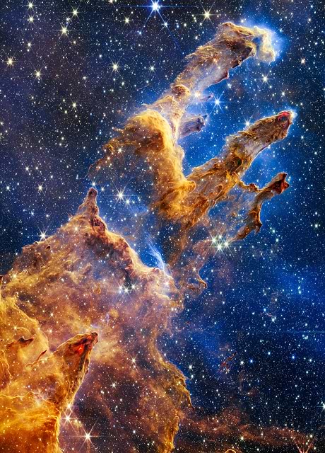 Embark on an astronomical journey with Pillars of Creation, a captivating digital artwork inspired by the iconic celestial feature captured by the James Webb Telescope.
