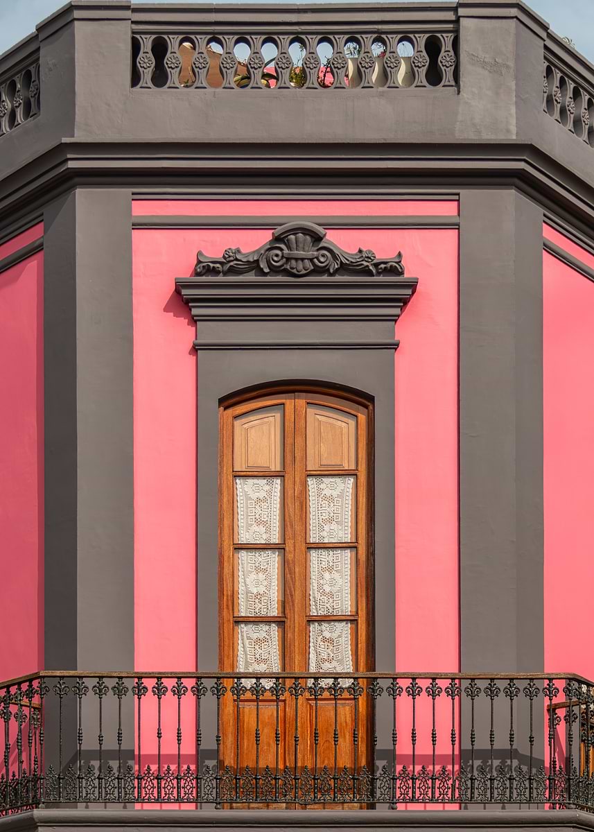 'Pink building with wooden door and balcony' Poster, picture, metal ...